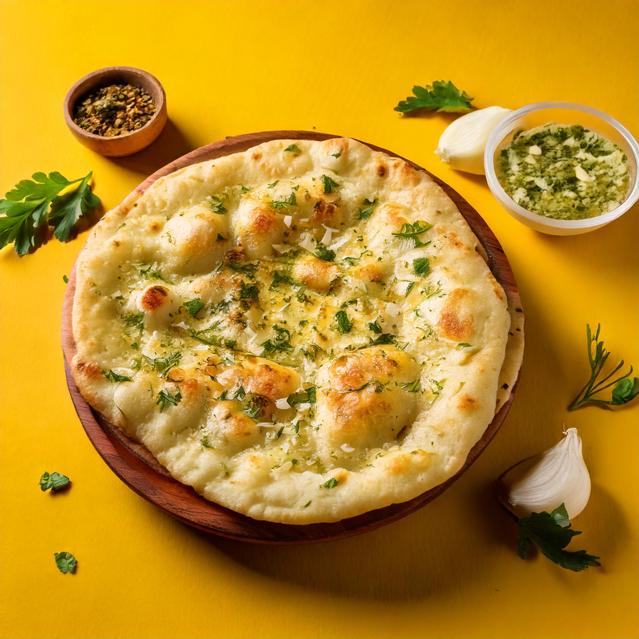 Garlic Naan — blødt fladbrød med hvidløg bagt i tandoor